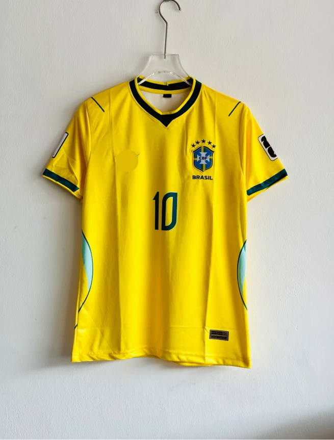 Brazil 2026 home kit Neymar number 10 yellow football jersey with embroidered team crest